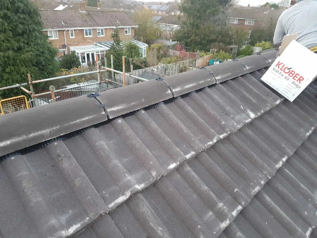 Newly tiled roof with dry ridge tiles fitted in Langley Green, Crawley